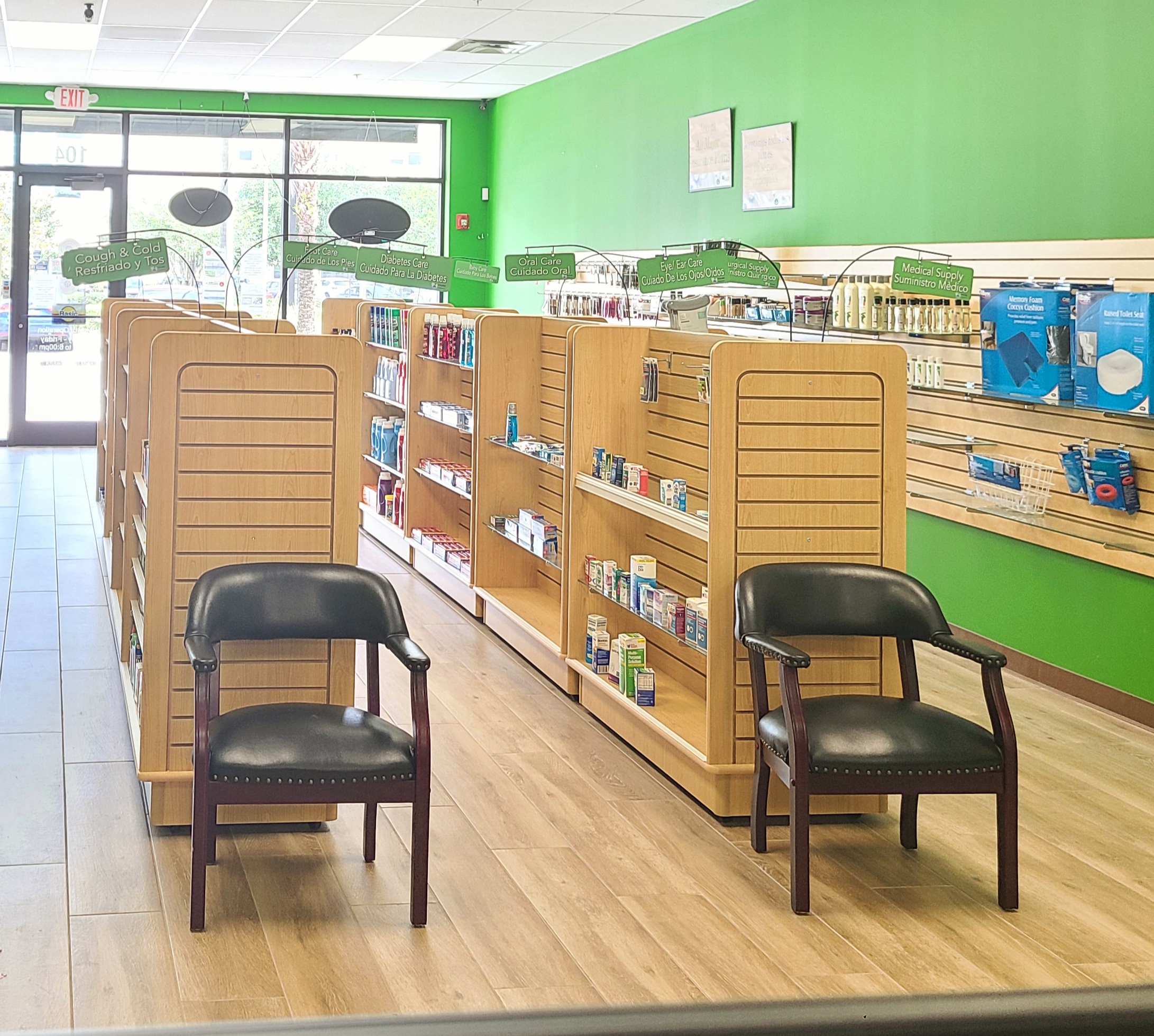 The seating area and pharmacy shelves inside Palms Pharmacy in Orlando